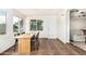 Inviting dining room with natural light and a view to the outdoors, connected to the living room at 2019 W Stella Ln, Phoenix, AZ 85015