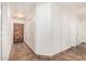 Welcoming foyer with tile flooring, a decorative wood front door, and neutral wall paint at 2019 W Stella Ln, Phoenix, AZ 85015
