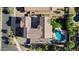 Aerial view showcasing the home's layout, pool, landscaped yard, and surrounding neighborhood at 21266 S 213Th Pl, Queen Creek, AZ 85142