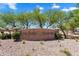 Welcoming entrance to Nauvoo Station with attractive signage and landscaping at 21266 S 213Th Pl, Queen Creek, AZ 85142