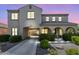 Stunning home exterior with porte-cochere, manicured landscaping, and inviting curb appeal at 21266 S 213Th Pl, Queen Creek, AZ 85142