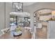 Open-concept living spaces featuring an open floorplan, a dining area, and living room at 21266 S 213Th Pl, Queen Creek, AZ 85142