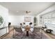 Airy living area featuring white walls, stylish seating, and ample natural light at 2156 E Cairo Dr, Tempe, AZ 85282