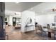 Bright living space with light wood floors, open layout, and modern furnishings at 2156 E Cairo Dr, Tempe, AZ 85282