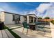 Relaxing backyard with a seating area and a fire pit, perfect for outdoor enjoyment at 23503 S 228Th Pl, Queen Creek, AZ 85142