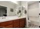 Bathroom featuring a dual sink vanity and shower over tub at 23503 S 228Th Pl, Queen Creek, AZ 85142