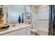 Well-lit bathroom featuring white cabinets, toilet, bathtub and shower, and modern decor at 24645 N 164Th Dr, Surprise, AZ 85387