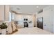 Bright kitchen featuring white cabinetry, stainless appliances, and a large island for cooking at 24645 N 164Th Dr, Surprise, AZ 85387