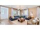 Cozy living room with stylish decor, comfortable seating, and a view of the outdoors at 24645 N 164Th Dr, Surprise, AZ 85387