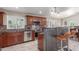 Modern kitchen featuring granite countertops, stainless steel appliances, and custom cabinetry at 2508 N Karen Dr, Chandler, AZ 85224