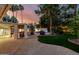 Secluded backyard paradise with a custom pool, bar, and manicured landscaping at 26 W Morten Ave, Phoenix, AZ 85021