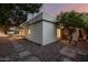 Backyard with view of home, pool and serene patio at 26 W Morten Ave, Phoenix, AZ 85021