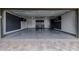 Spacious garage with custom storage cabinets and epoxy flooring at 26 W Morten Ave, Phoenix, AZ 85021