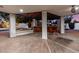 Covered outdoor bar area with seating, perfect for poolside relaxation and enjoyment at 26 W Morten Ave, Phoenix, AZ 85021