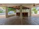 Spacious covered patio with bar area overlooking the inviting swimming pool at 26 W Morten Ave, Phoenix, AZ 85021