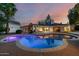 Inviting backyard pool with seamless flow to the home's indoor-outdoor living at 26 W Morten Ave, Phoenix, AZ 85021
