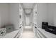 Walk-in closet with custom shelving, drawers, and storage throughout at 26 W Morten Ave, Phoenix, AZ 85021