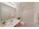 Bright bathroom with tiled floor, white fixtures, and plenty of counter space at 2627 E Gary Way, Phoenix, AZ 85042