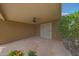 Covered patio with ceiling fan and flagstone flooring is perfect for outdoor entertaining at 2627 E Gary Way, Phoenix, AZ 85042