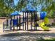 Community playground featuring blue and yellow play structures, perfect for recreation at 2627 E Gary Way, Phoenix, AZ 85042