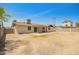 Home exterior showing a covered patio in the backyard, secured with block walls at 2826 E Cactus Rd, Phoenix, AZ 85032