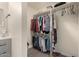 Walk-in closet featuring ample storage space and shelving at 2826 E Cactus Rd, Phoenix, AZ 85032