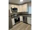 Well-equipped kitchen with modern appliances and sleek countertops at 286 W Palomino Dr # 105, Chandler, AZ 85225