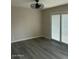 Spacious living room with sliding glass doors for natural light at 286 W Palomino Dr # 105, Chandler, AZ 85225
