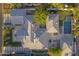 Stunning aerial view of the property showing the roof, landscaping, pool, and putting green at 3429 E Coolidge St, Phoenix, AZ 85018