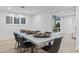 Modern dining room features stylish decor, neutral tones, and large windows at 3429 E Coolidge St, Phoenix, AZ 85018