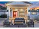 Stylish outdoor patio with modern furniture, stone accents, and inviting outdoor ambiance at 3429 E Coolidge St, Phoenix, AZ 85018