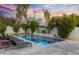Relaxing pool area with lounge seating and landscaping at 3429 E Coolidge St, Phoenix, AZ 85018