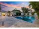 Lovely swimming pool and outdoor patio at dusk at 3429 E Coolidge St, Phoenix, AZ 85018