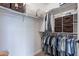 Walk-in closet with clothing racks, shelving, and storage for an organized space at 36047 N Copper Hollow Way, Queen Creek, AZ 85140