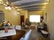 Inviting living room featuring neutral colors, beamed ceilings, and lots of natural light at 3726 W Campo Bello Dr, Glendale, AZ 85308