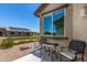 Cozy backyard patio area with comfortable seating, ideal for outdoor enjoyment at 41825 W Mesquite Rd, Maricopa, AZ 85138