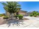 Charming home featuring a well-maintained yard and a two-car garage at 41825 W Mesquite Rd, Maricopa, AZ 85138