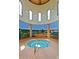 Enclosed hot tub area with scenic mural views, perfect for relaxation and leisure at 41825 W Mesquite Rd, Maricopa, AZ 85138