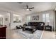 Open-concept living room with stylish furniture and natural light at 41825 W Mesquite Rd, Maricopa, AZ 85138