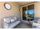 Relaxing covered patio area with comfortable seating, perfect for outdoor enjoyment at 41825 W Mesquite Rd, Maricopa, AZ 85138