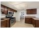 Well-maintained kitchen featuring modern stainless steel appliances and ample cabinet space at 4257 E Marino Dr, Phoenix, AZ 85032