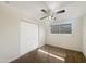 Bedroom with a ceiling fan and window with blinds at 4533 W Cavalier Dr, Glendale, AZ 85301