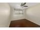 Bedroom with modern flooring, ceiling fan, and window at 4533 W Cavalier Dr, Glendale, AZ 85301