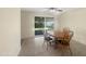 Dining area featuring table and chairs and a sliding glass door at 4533 W Cavalier Dr, Glendale, AZ 85301