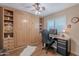 Stylish bedroom with built-in murphy bed and desk area perfect for a home office at 490 W Encinas St, Gilbert, AZ 85233