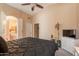 Serene bedroom with neutral paint, en-suite bathroom, and plenty of natural light at 490 W Encinas St, Gilbert, AZ 85233