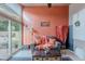 Comfortable secondary living room with warm colors, a cozy couch, and natural light at 490 W Encinas St, Gilbert, AZ 85233