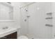 Clean bathroom featuring subway tile walls, hexagon tile floor, and updated fixtures at 5011 S 20Th Pl, Phoenix, AZ 85040