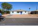 Well-kept home with a blue front door and drought-tolerant landscaping for easy maintenance at 5011 S 20Th Pl, Phoenix, AZ 85040