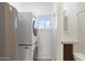 Laundry area with washer and dryer, next to the bathroom at 5011 S 20Th Pl, Phoenix, AZ 85040